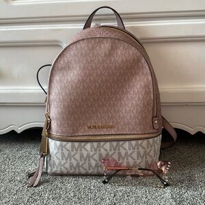 Michael Kors bag and butterfly glasses